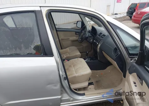 2012 Suzuki Sx4 Le/Le Popular z USA, uszkodzony, nr VIN JS2YC5A38C6303857